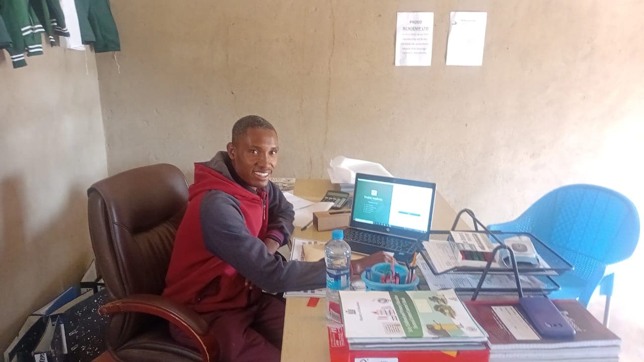 Nsembe SMS in use in the Pro Ed Academy office